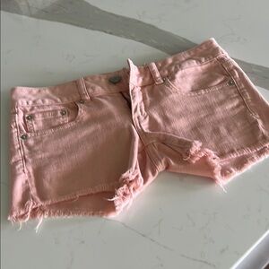 VINTAGE!! 2011 low rise -American Eagle Outfitters Pink Jean Shorts Frayed Hem